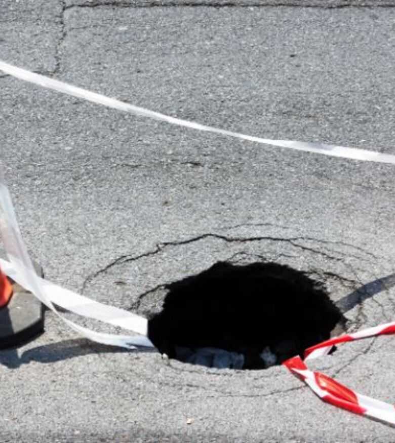 How to Handle a Sinkhole in Tampa - sinkhole in the street