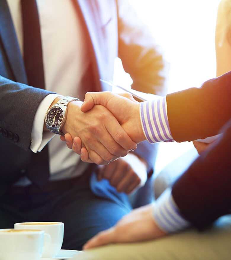 Tallahassee Commercial and Business Litigation Attorneys - lawyers shaking hands
