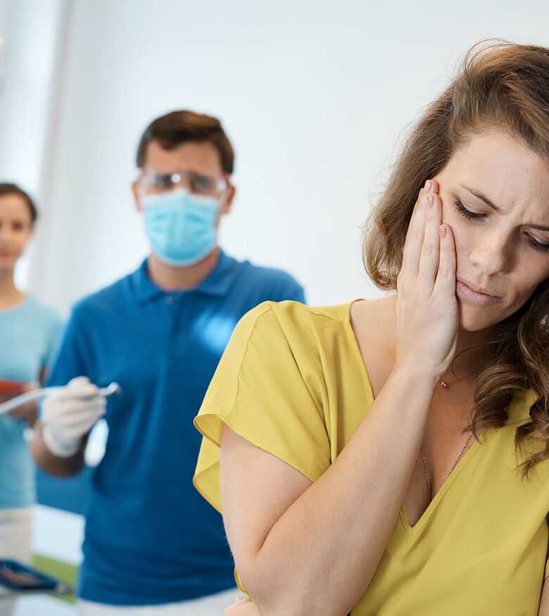 Dental Malpractice Attorneys in Miami, FL - Woman with dental pain at dentist