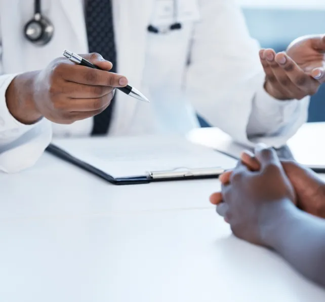 Healthcare, clipboard and hands of doctor with patient for discussion, treatment and medical service. Hospital, clinic and health person with paperwork for insurance, wellness and consulting report