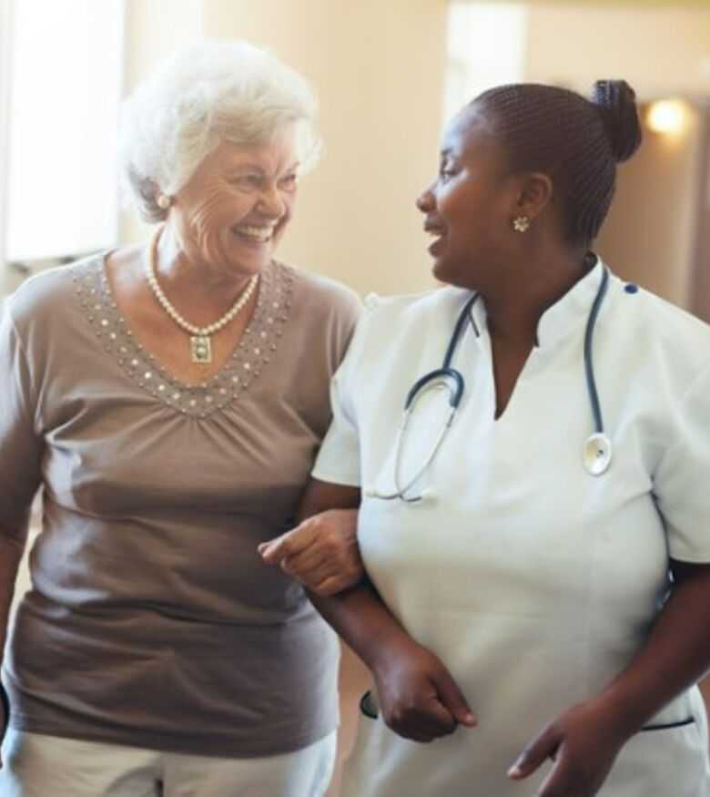 Nursing Home Abuse Attorneys in Deland, FL - Elderly woman and Nursing Home Caretaker