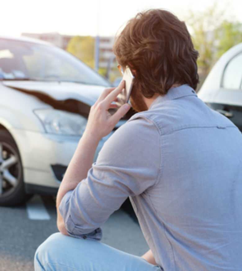 What Should I Do After a Car Wreck Death in Gainesville, FL? - Man on phone call after car wreck