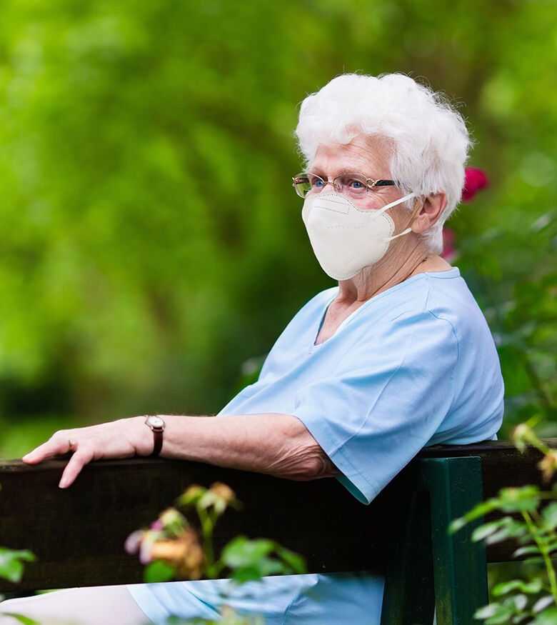 Coronavirus Nursing Home Neglect in NY - Elderly woman in mask