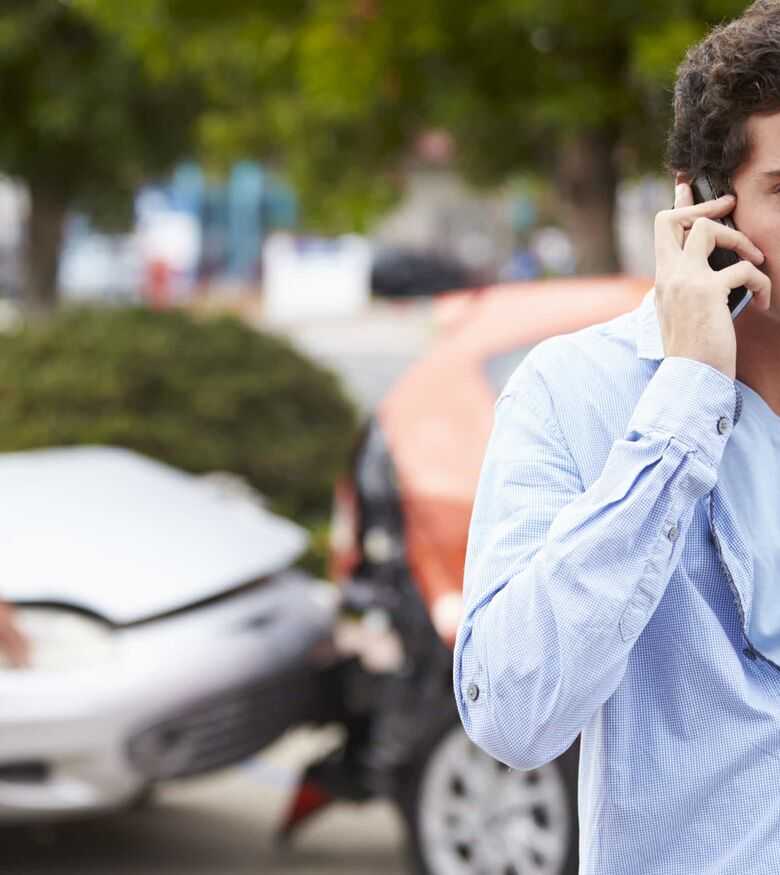 Charlotte, NC Car Accident Lawyers - Car Accident with man on the phone