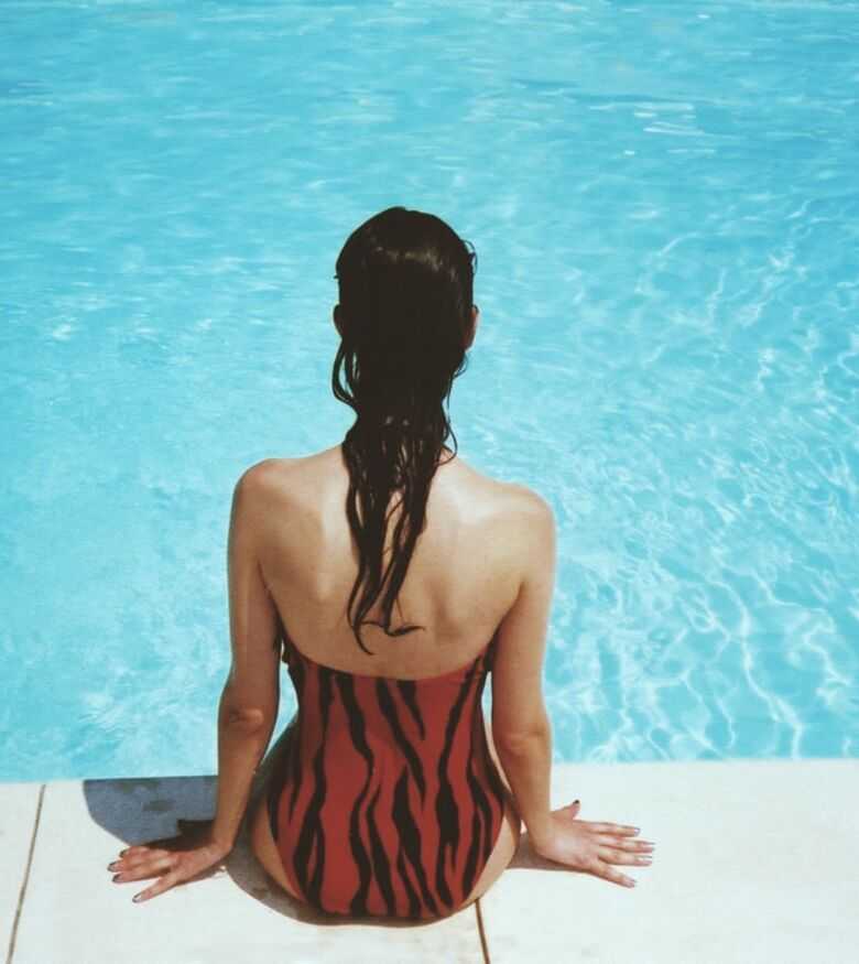 Swimming Pool Accidents in Alpharetta - lady sitting at the swimming pool