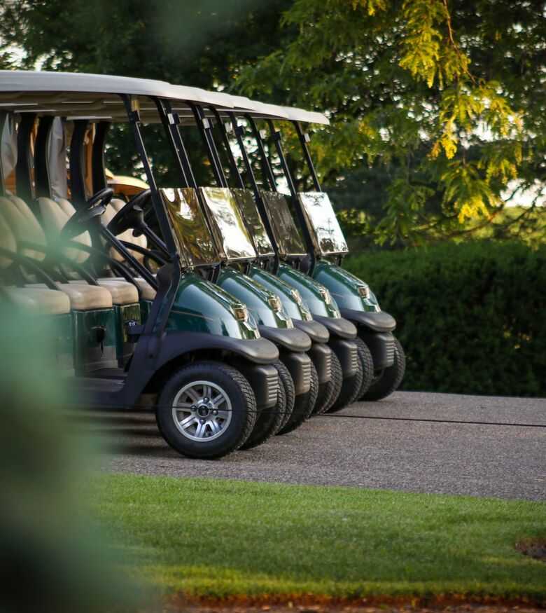 Why Is a Golf Cart Accident Lawyer Important in Pensacola - golf carts parked on street