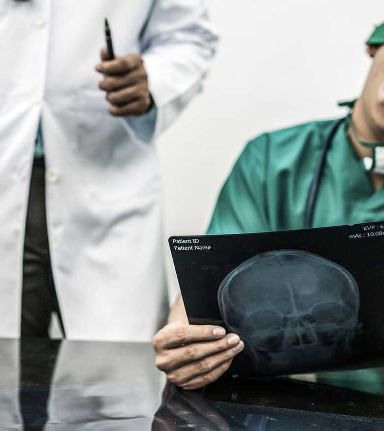 Medical Malpractice Lawyers in Atlanta, GA - Man face palming at brain scan