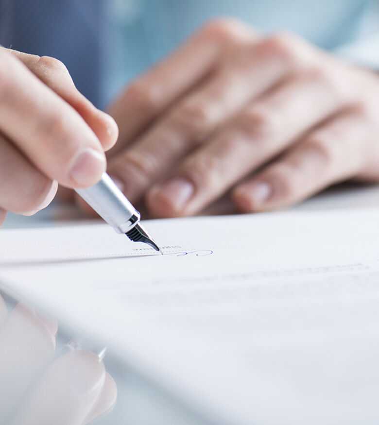Breach-of-Contract Attorneys in Fort Lauderdale, FL - Man writing on paper