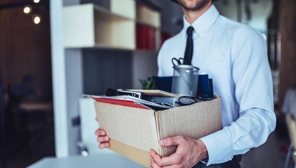 Man with Box of office supplies