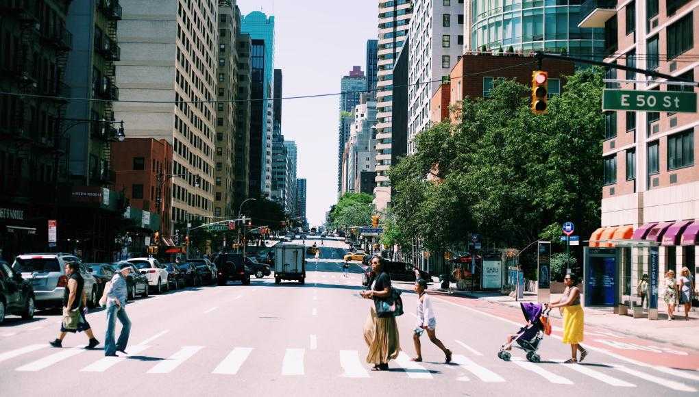 pedestrian walking across the street