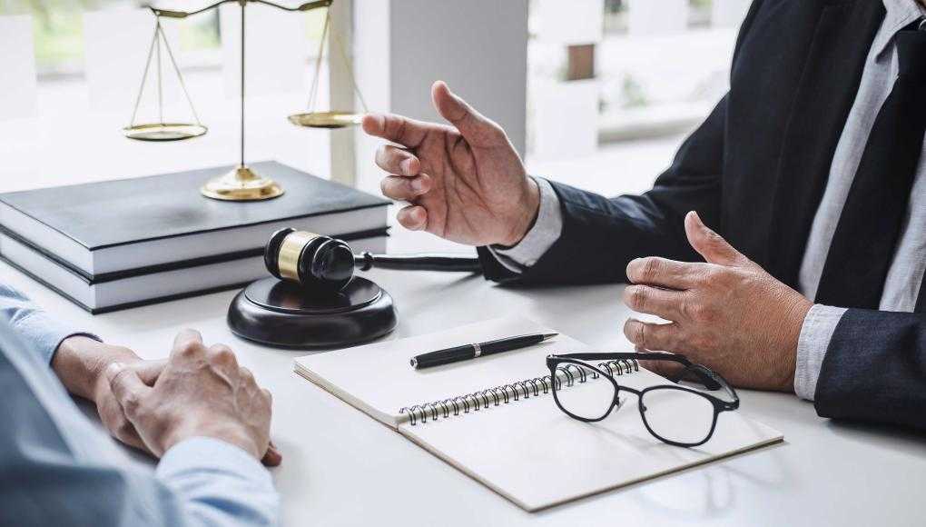 lawyer talking to person