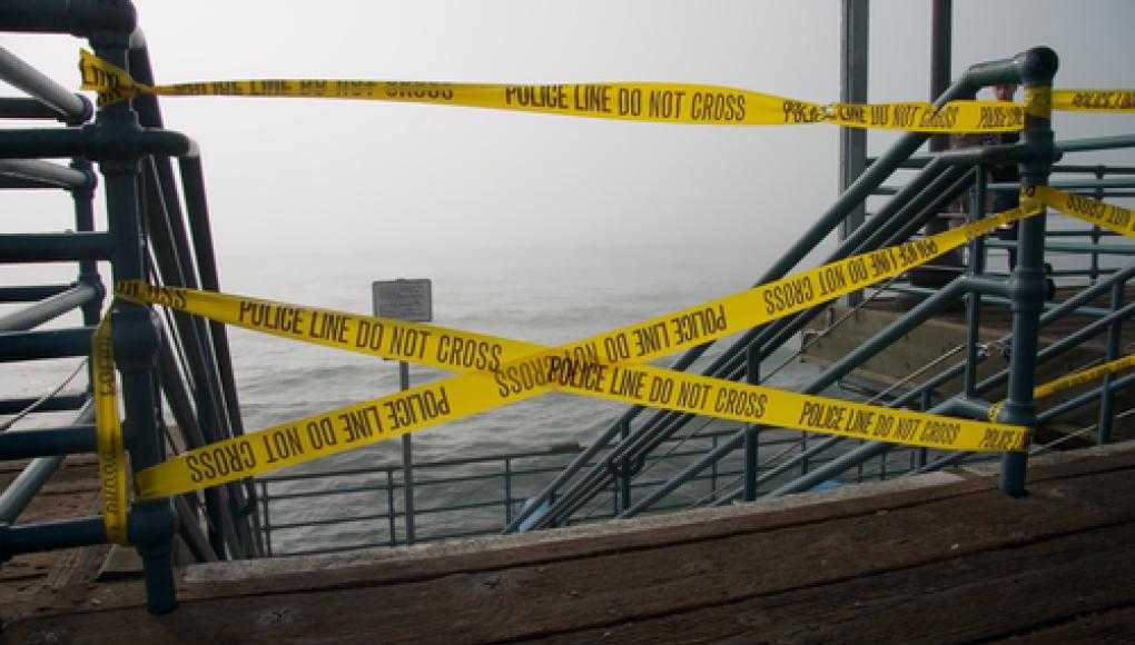 Speed Boat Operator in Fatal Crash Charged With 13 Felonies - Police Tape at Dock