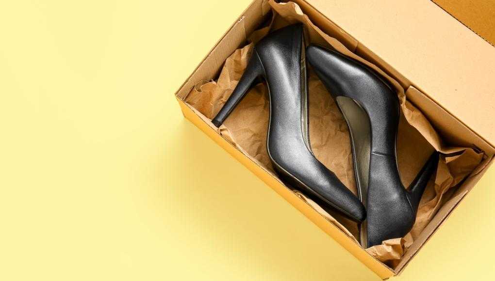 Black high heels in a box - Risks and injuries from high heels, Morgan & Morgan legal help.