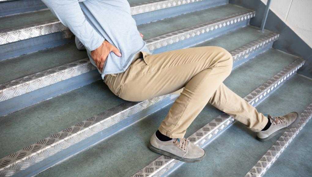 man falling down stairs