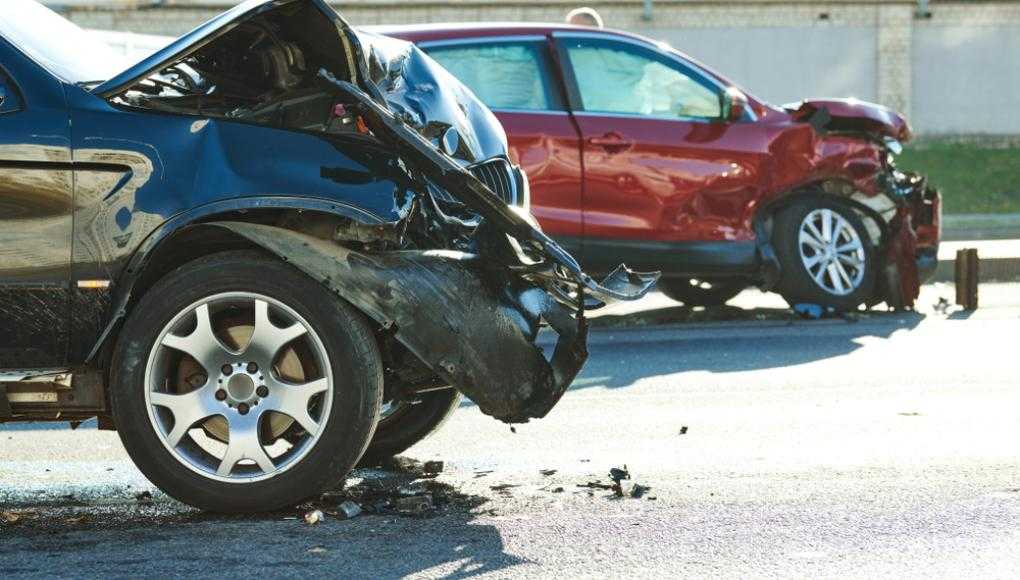 Two damaged cars after an accident on the street