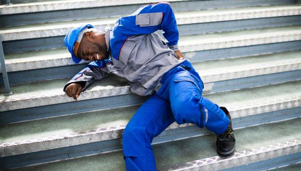 Worker fallen down stairs in pain