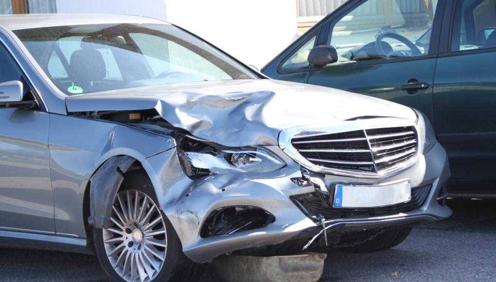 Damaged silver car