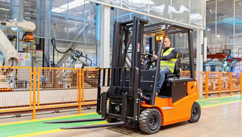 Man operating a fork lift