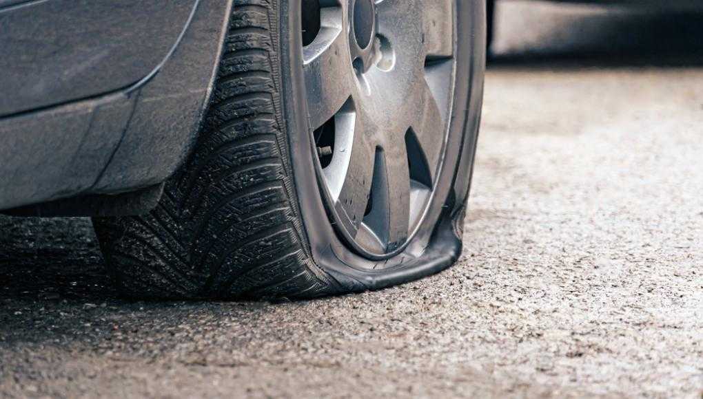 Close up of a flat tire