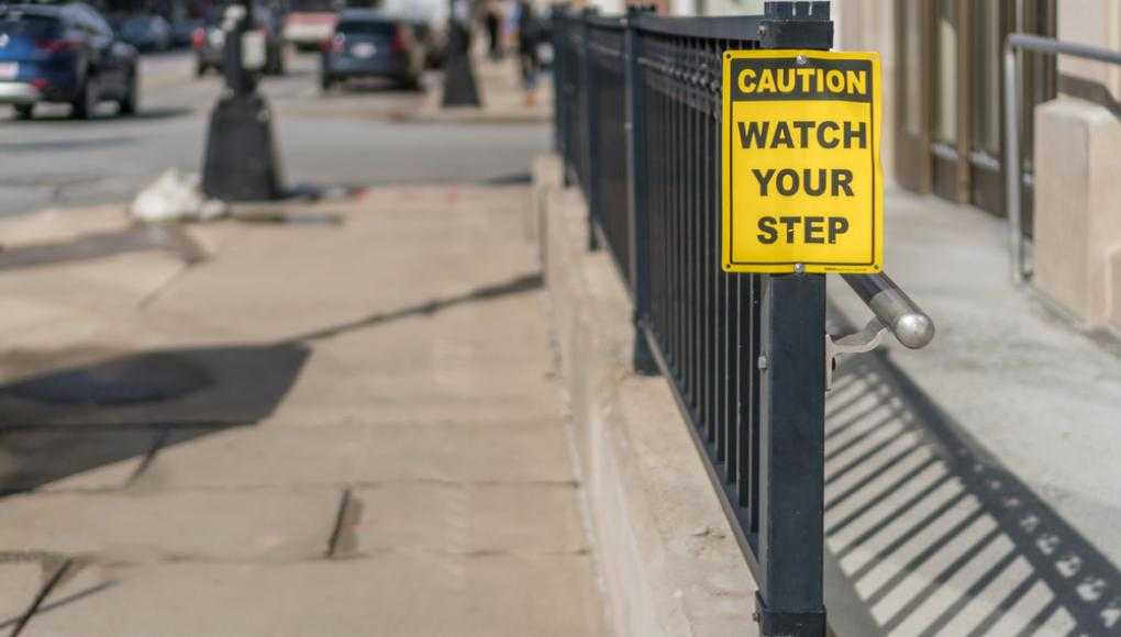 Watch your step sign