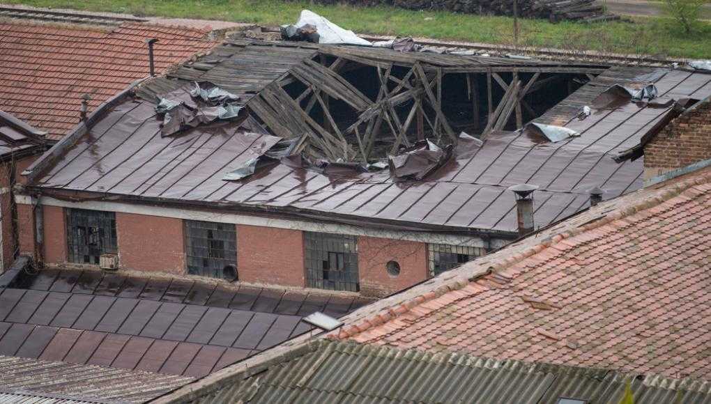 Building with a damaged roof