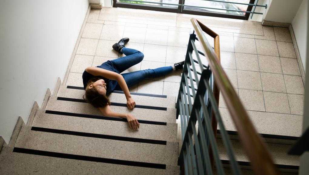 Woman fallen down the stairs