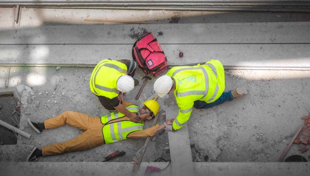 Man being helped after being injured at work