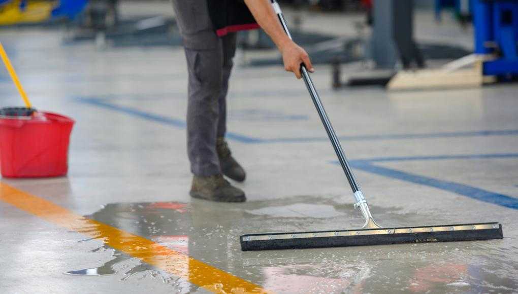 Man cleaning the floors