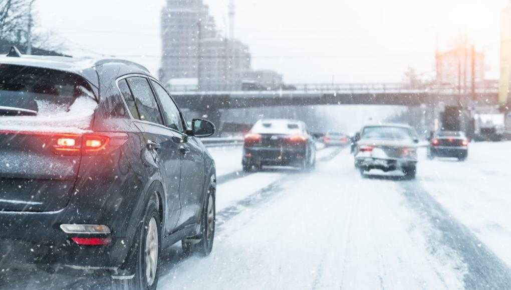 Cars driving on a snowy road