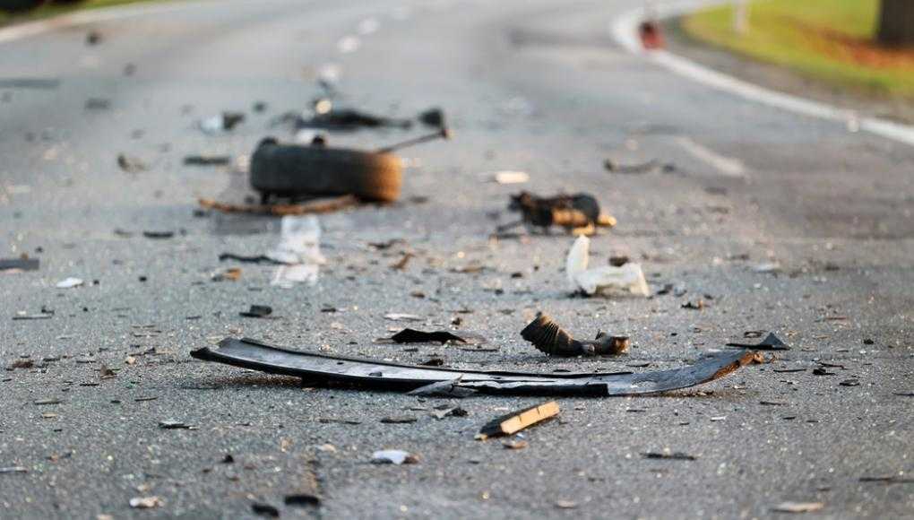 Debris from a car accident on a road