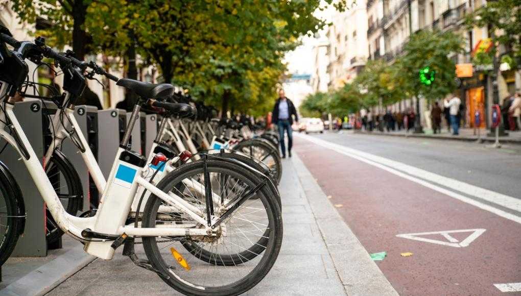 Row of e-bikes on a city street