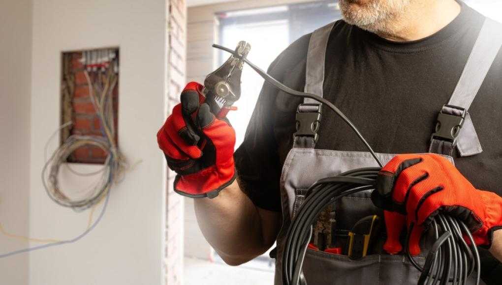 Electrician working in a home