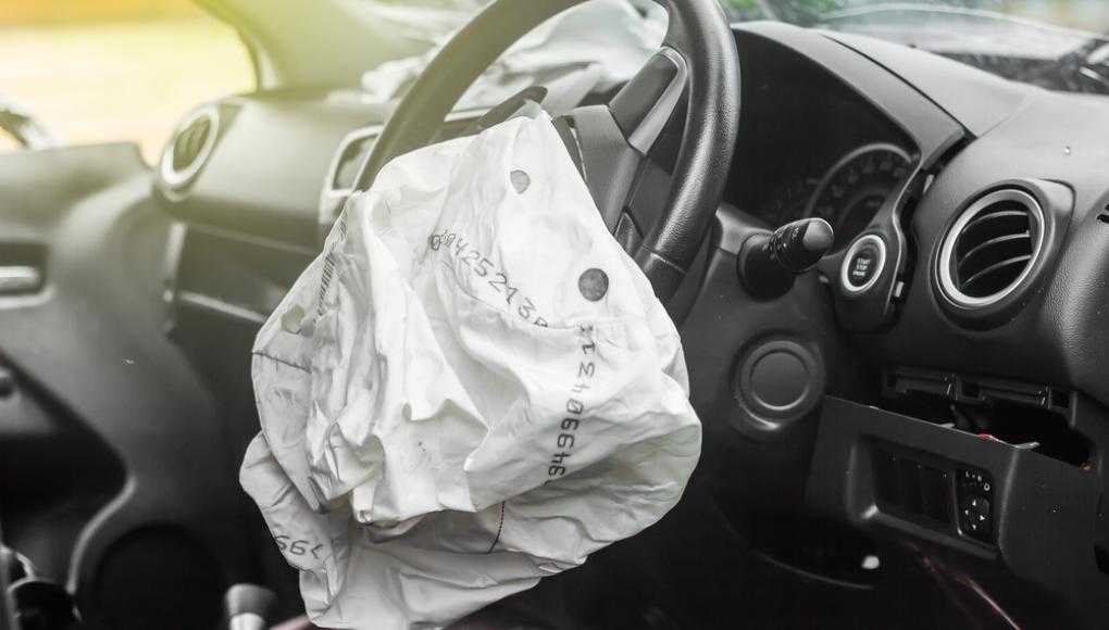 Exploded airbag in a car