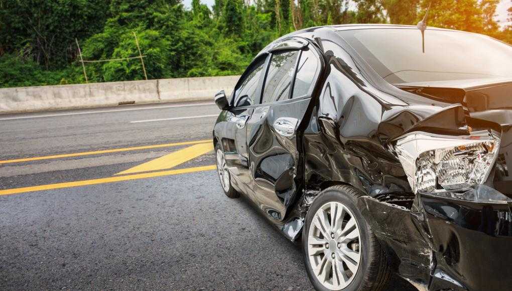 Damaged back car on the street