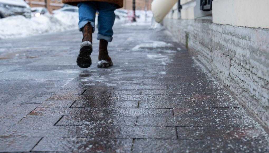 Someone walking on an icy sidewalk