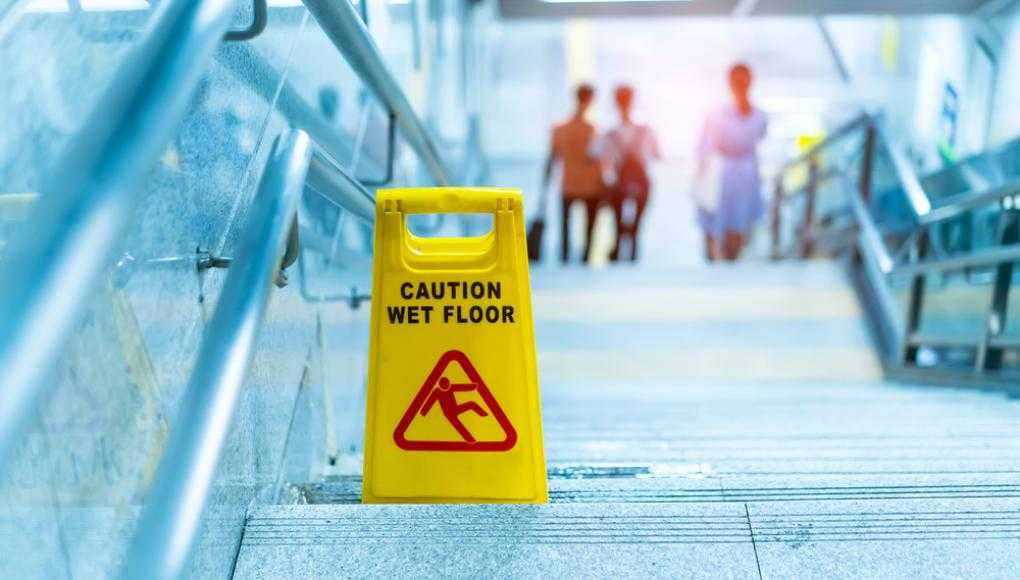 slippery floor sign on the stairs