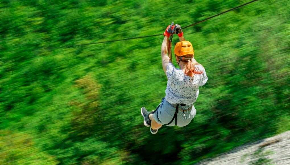 ziplining over a beautiful mountain