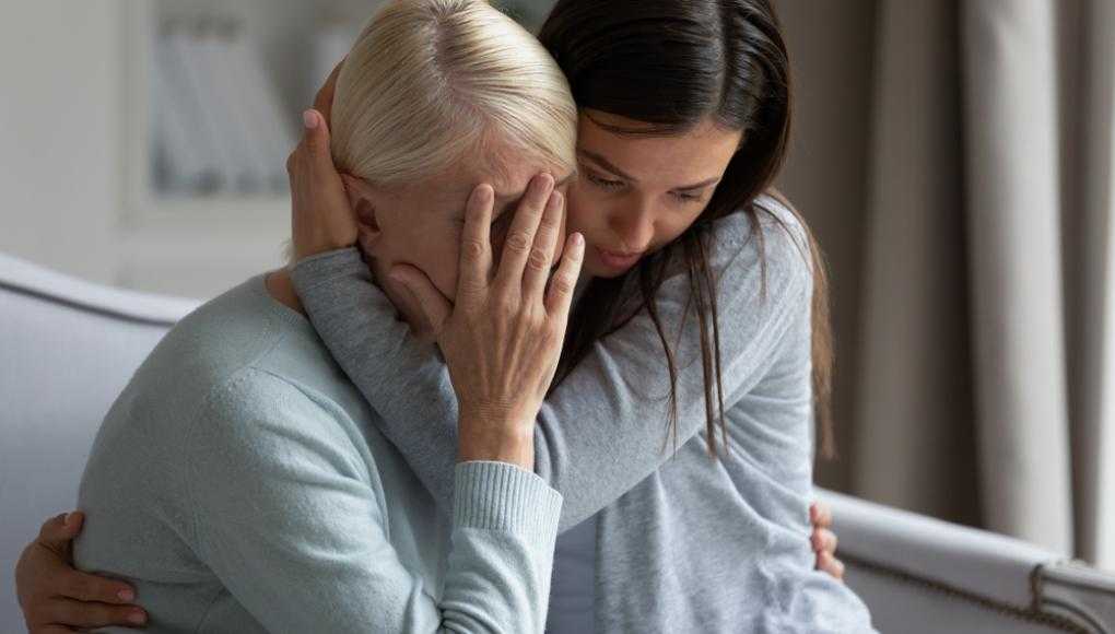 nurse comforting mom after wrongful death