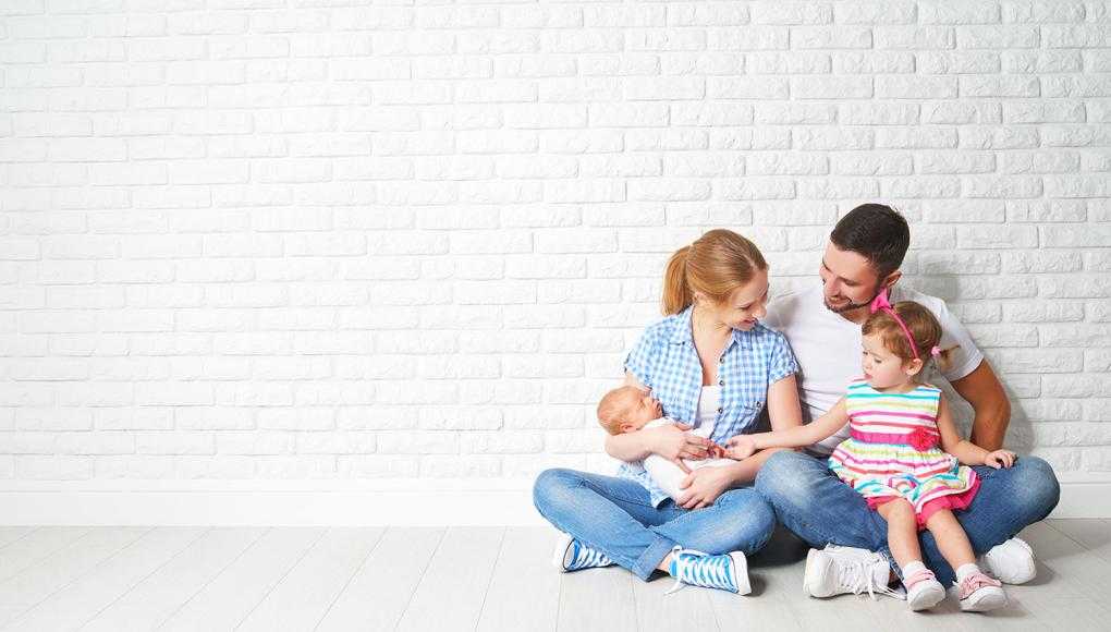 Family sitting on floor