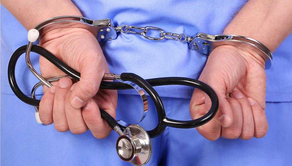 Florida Whistleblower Exposes Healthcare Fraud - Doctor with a handcuff