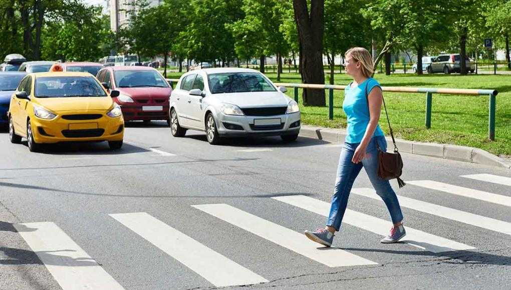 JAX Pedestrian Death Zone: Can the City Become a Better Place to Walk? - women walking on pedestrian lane