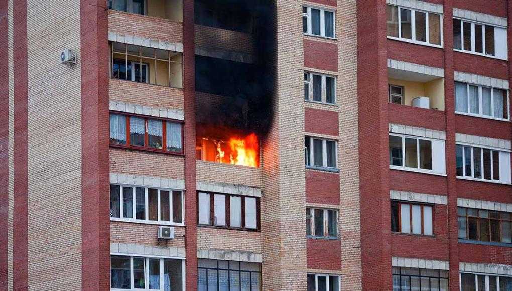 Fatal Oakland Apt. Fire News: Landlord Had History of Violations - building on fire