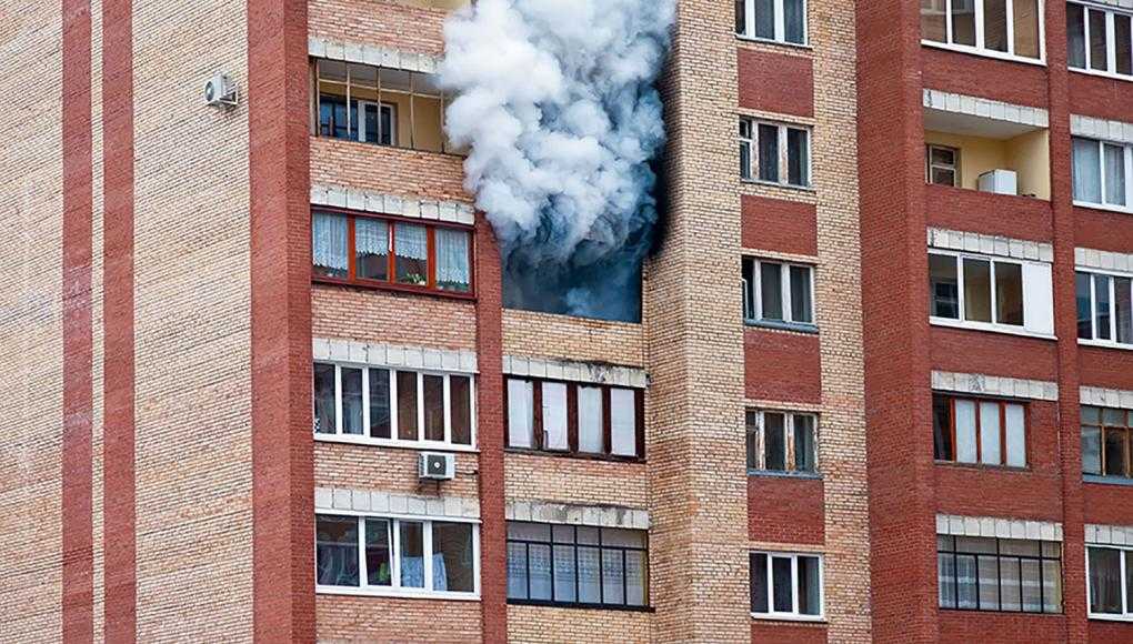 Smoke coming out Apartment Building