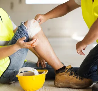 Understanding Personal Injury Protection (PIP) - worker injured his knee
