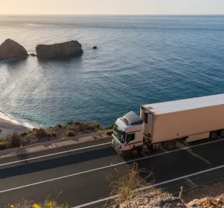 How to Hire the Best Truck Accident Lawyer - truck driving along the highway