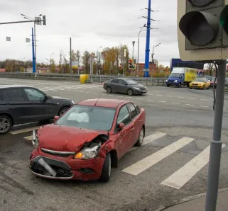 Damaged car at an intersection