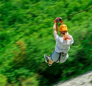 ziplining over a beautiful mountain