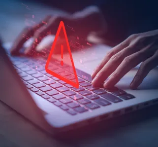 System hacked warning alert on notebook (Laptop). Cyber attack on computer network, Virus, Spyware, Malware or Malicious software. Cyber security and cybercrime. Compromised information internet.