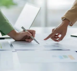 Business investor analyzing a valuation data forecast a investment project.