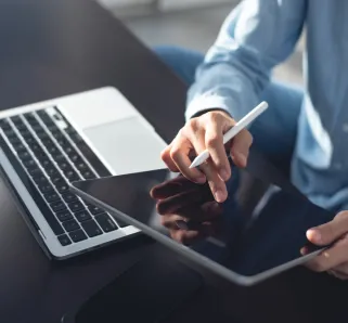 employee using their laptop and working